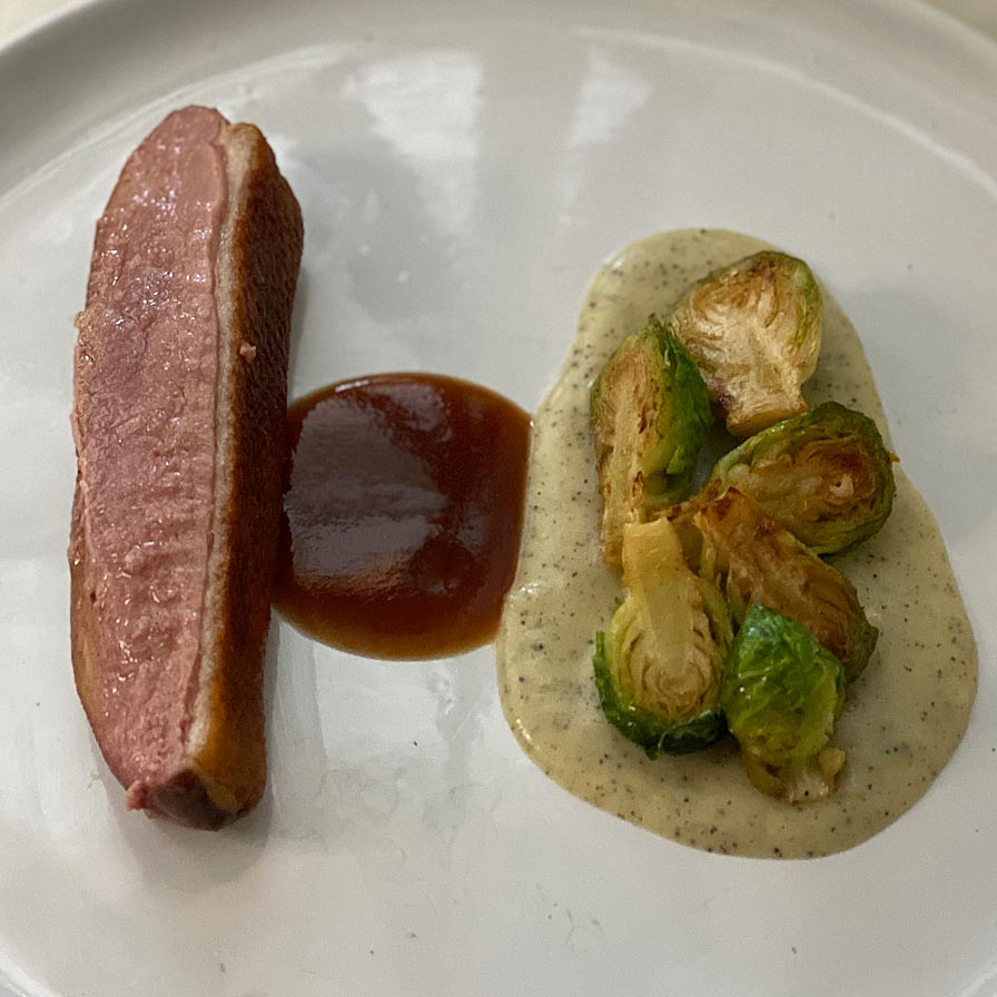 Rōze Traore Roasted Duck with Potato and Brussels Sprouts